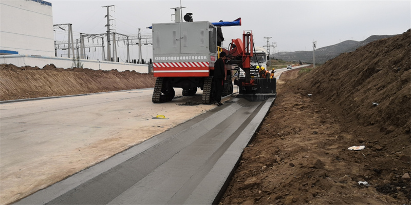 履帶式公路邊溝滑模機(jī)